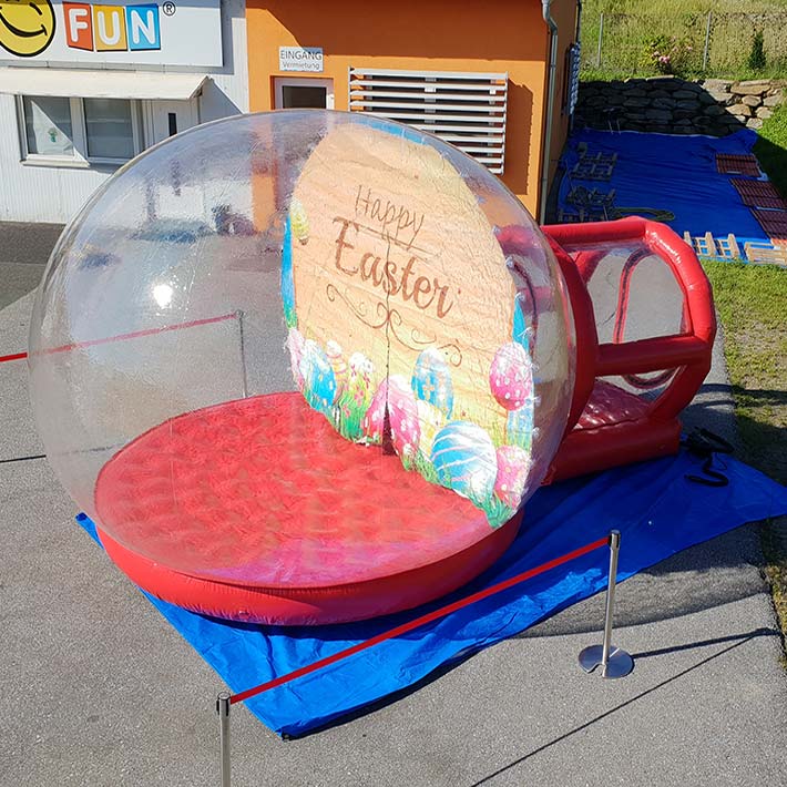 Begehbare, Transparente aufblasbare Oster-Fotokugel zum mieten für jedes Event.