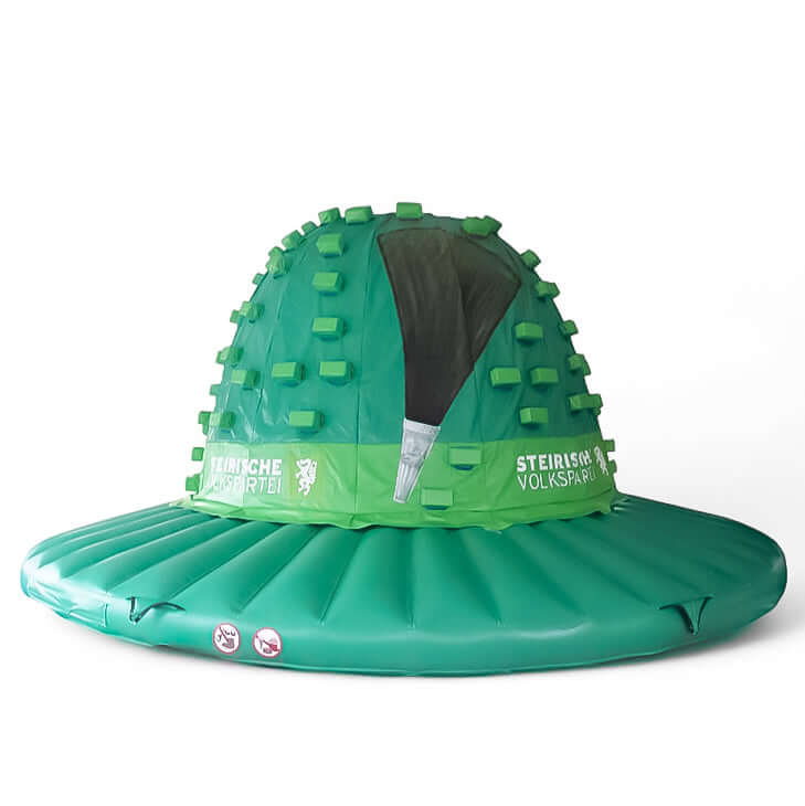 Hüpfburg Hut -  Kletterberg als Steirerhut mit Feder - Aufblasbare Produktnachbildung kaufen | Werben in Großformat Hüpfburg Hut -  Kletterberg als Steirerhut mit Feder - Aufblasbare Produktnachbildung kaufen | Werben in Großformat