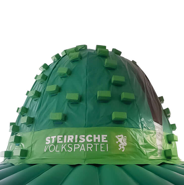 Hüpfburg Hut -  Kletterberg als Steirerhut mit Feder - Aufblasbare Produktnachbildung kaufen | Werben in Großformat Hüpfburg Hut -  Kletterberg als Steirerhut mit Feder - Aufblasbare Produktnachbildung kaufen | Werben in Großformat