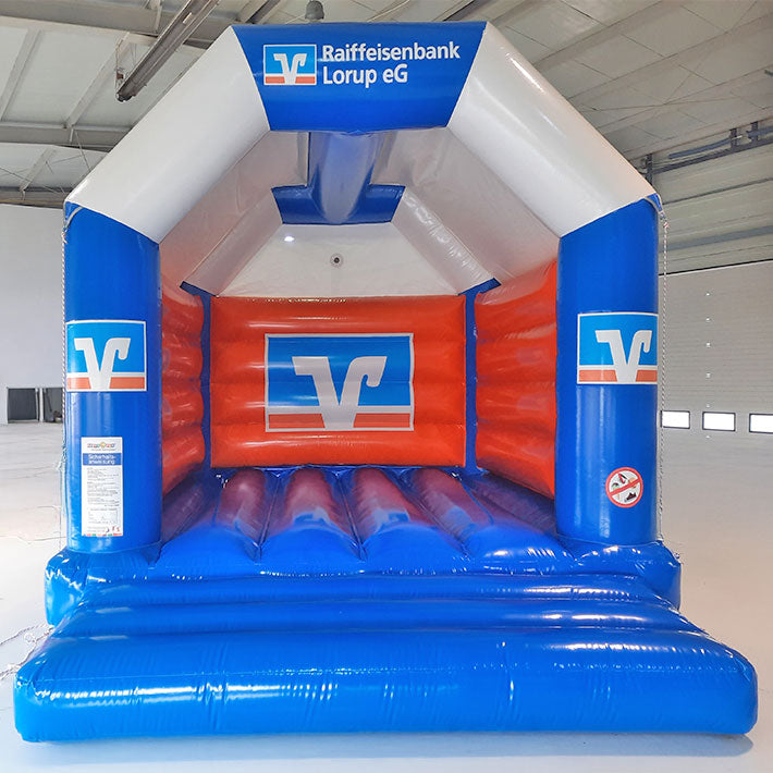 Hüpfburg Raiffeisen -Volksbank Lorup eG mit individuellen Werbeaufdruck - Aufblasbare Werbung | Werbeträger | Inflatables online kaufen! Hüpfburg Raiffeisen -Volksbank Lorup eG mit individuellen Werbeaufdruck - Aufblasbare Werbung | Werbeträger | Inflatables online kaufen!
