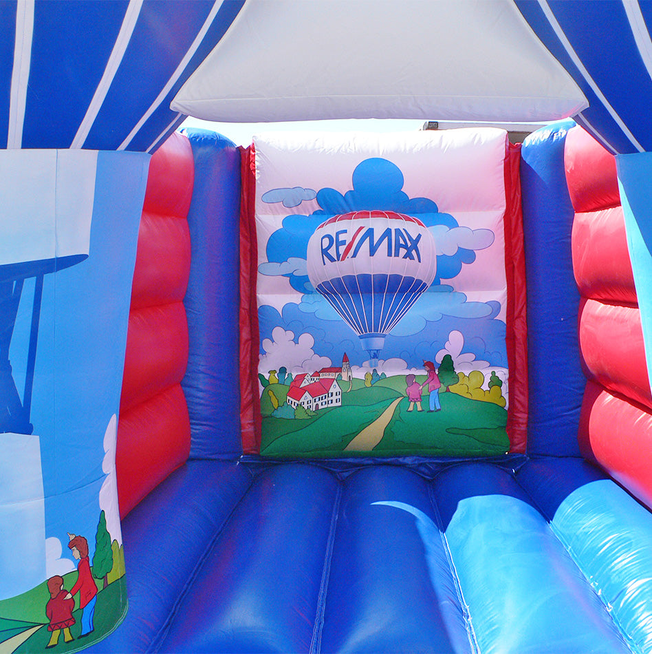 Hüpfburg REMAX Immobilien mit Heißluftballon - Aufblasbare Werbung | Werbeträger | Inflatables online kaufen! Hüpfburg REMAX Immobilien mit Heißluftballon - Aufblasbare Werbung | Werbeträger | Inflatables online kaufen!