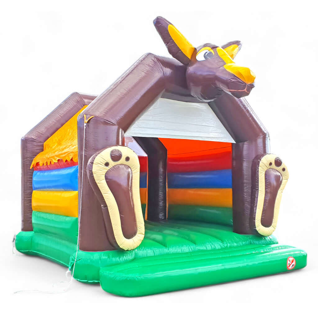 Aufblasbare Hüpfburg in braun mit Orangem Dach.