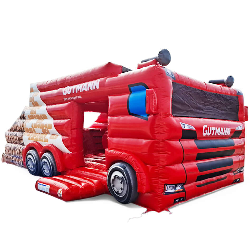 Aufblasbare Hüpfburg in Form eines roten Lastwagens mit Rutsche – individuell gefertigt für Markenauftritte
