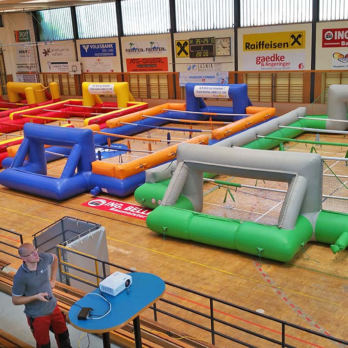 Riesenwuzzler mieten 12 Spieler – Profi-Modell 17 × 9 m in Blau-Gelb - Sport Spiele mieten | Fußball Dart | Water Soccer ✔ Verleih Riesenwuzzler mieten 12 Spieler – Profi-Modell 17 × 9 m in Blau-Gelb - Sport Spiele mieten | Fußball Dart | Water Soccer ✔ Verleih