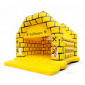Aufblasbare Hüpfburg mit Raiffeisen-Logo, gelben Türmen und robuster Seitenstruktur – jetzt individuell kaufen