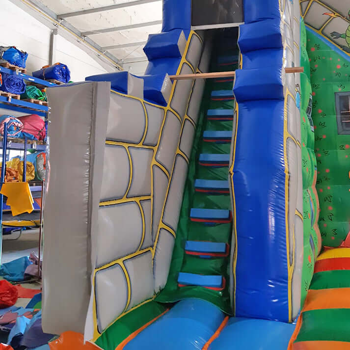 Rutsche Aufstieg Hüpfburg Drachenwelt Snappy mit Maulrutsche, Ritterburg-Design und buntem Spielbereich – riesiger Drachen-Spaß für Kinder