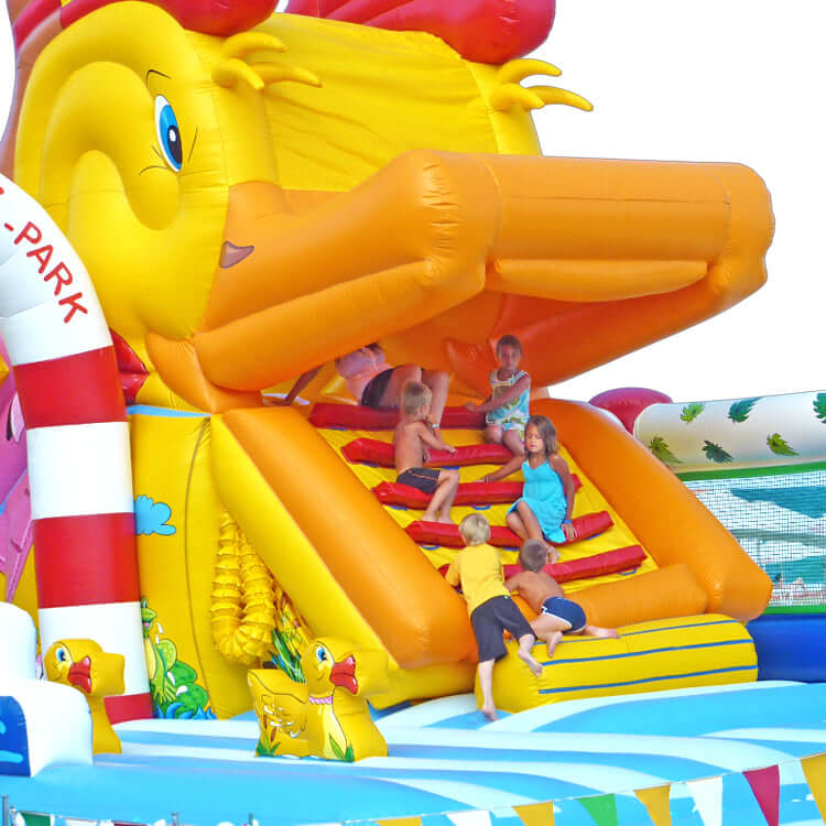 Entenschnabel Aufblasbare Hüpfburg Ente Snappy Super mit Riesenrutsche, Entenkopf-Design, Palmen und Wasserpark-Elementen – bunter Spielspaß für Kinder