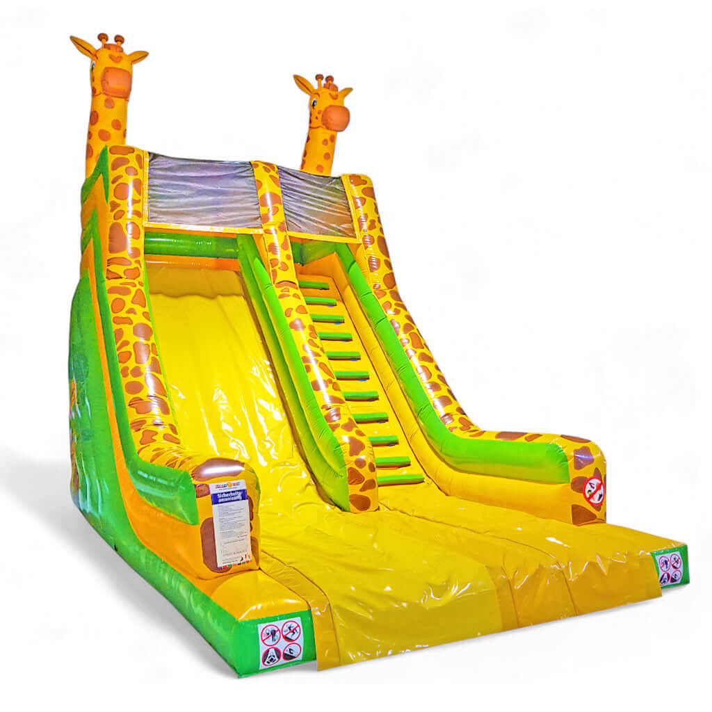 Hüpfburg Riesenrutsche Giraffe mit gelber Rutschfläche, grünen Seitenteilen und zwei großen Giraffenköpfen – aufblasbare Attraktion für Kinder