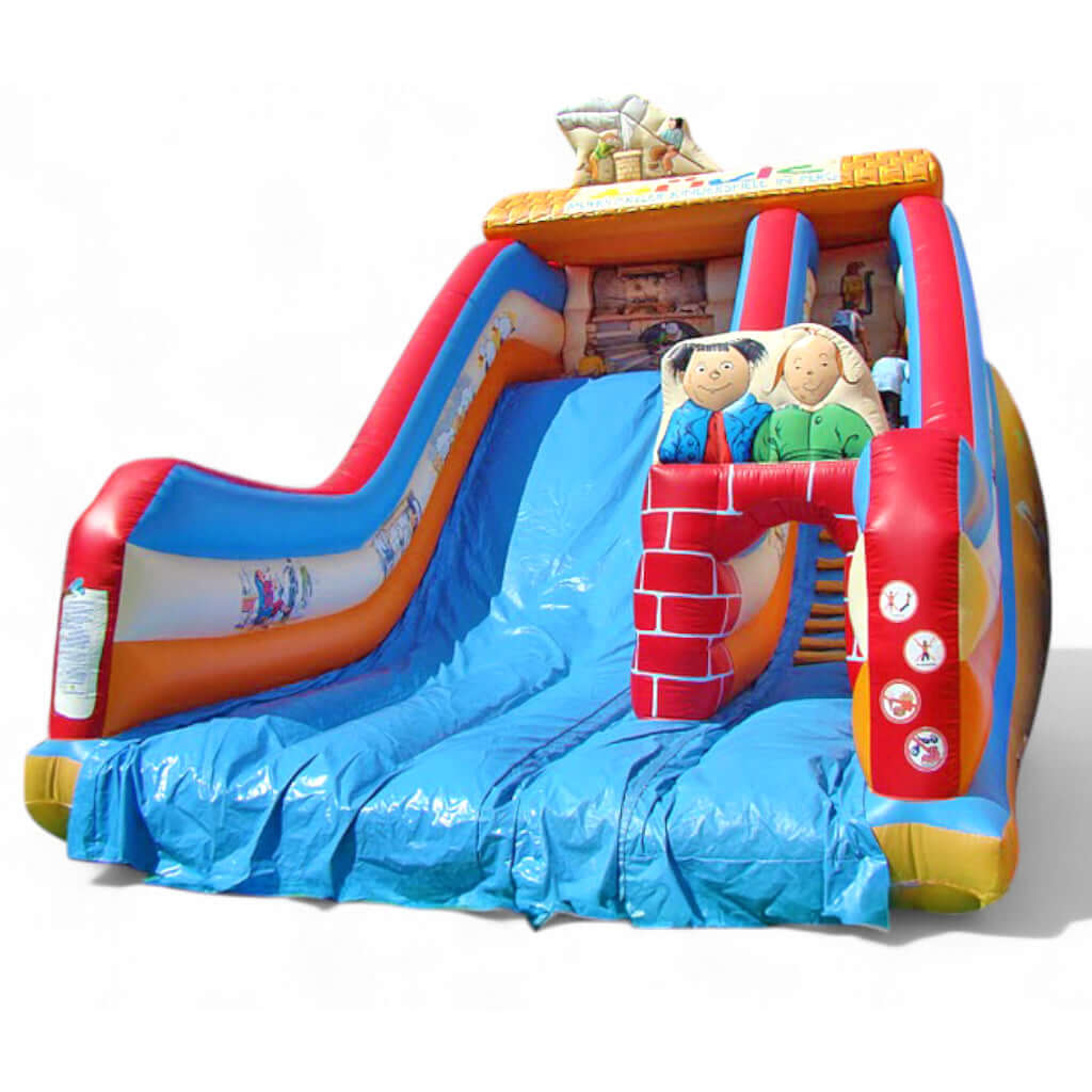 Hüpfburg Riesenrutsche Max & Moritz mit blauer Rutschfläche, Figurenaufstieg und Märchenmotiven – aufblasbares Eventmodul für Kinder