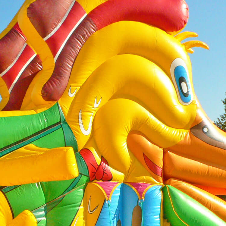 Kopf Hüpfburg Snappy Maulrutsche Ente mit steuerbarem Schnabel & Rückseitenrutsche jetzt kaufen – interaktives Eventmodul für Kinder & Outdoor-Spaß.