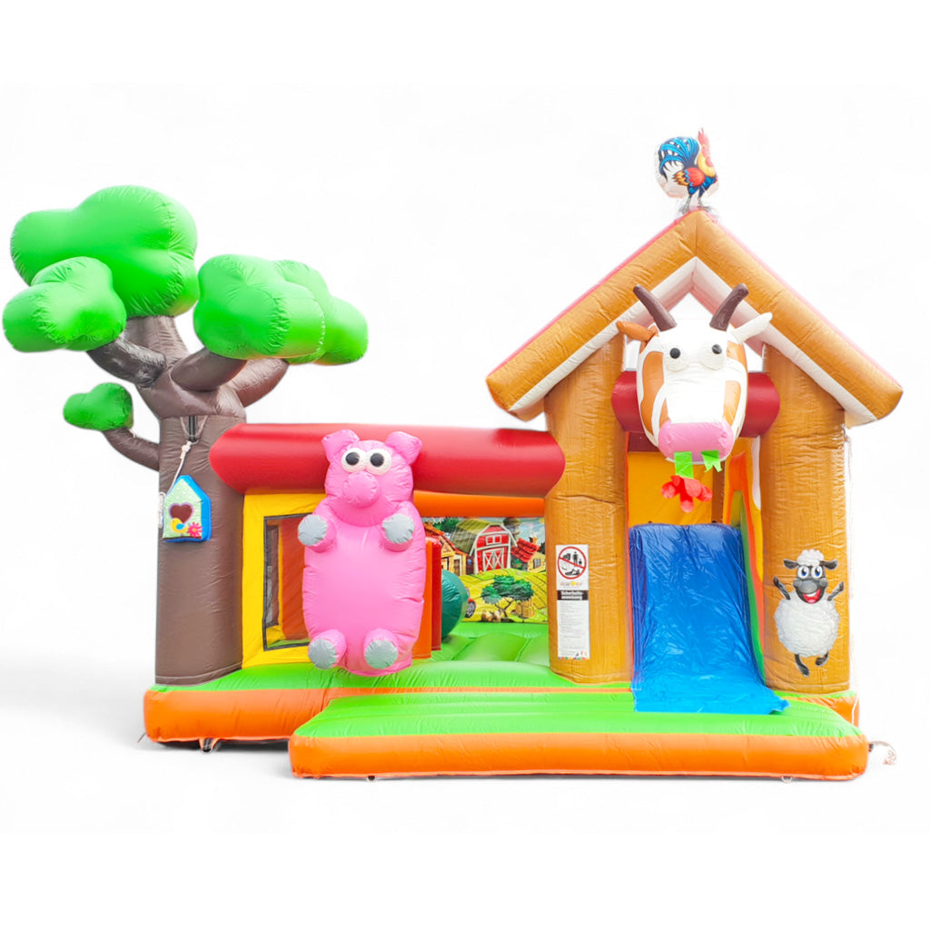 Eine Bauernhof Hüpfburg mit vielen Tieren vom Bauernhof.