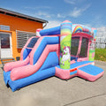 Die kleine Einhorn Hüpfburg mit Rutsche in rosa und blau zum mieten.