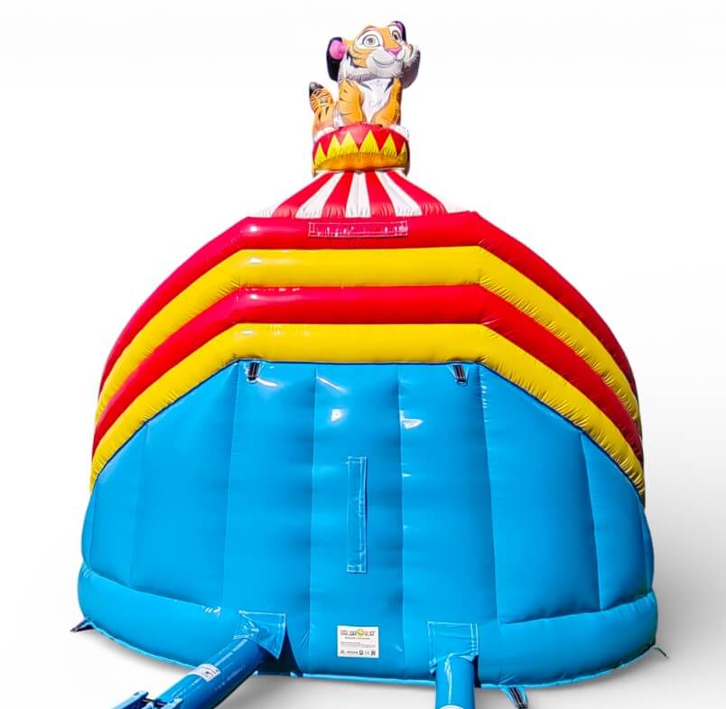 Aufblasbare Zirkus-Hüpfburg mit Tigerfigur und buntem Zirkus-Design