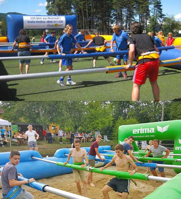 Aufblasbare große Riesenwuzzler werden bespielt.Human Foosball | Buy Giant Wuzzler ✔ Professional Tournament Foosball